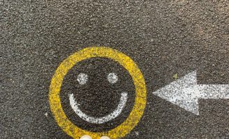 smiley face on a road