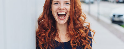 happy red hair woman